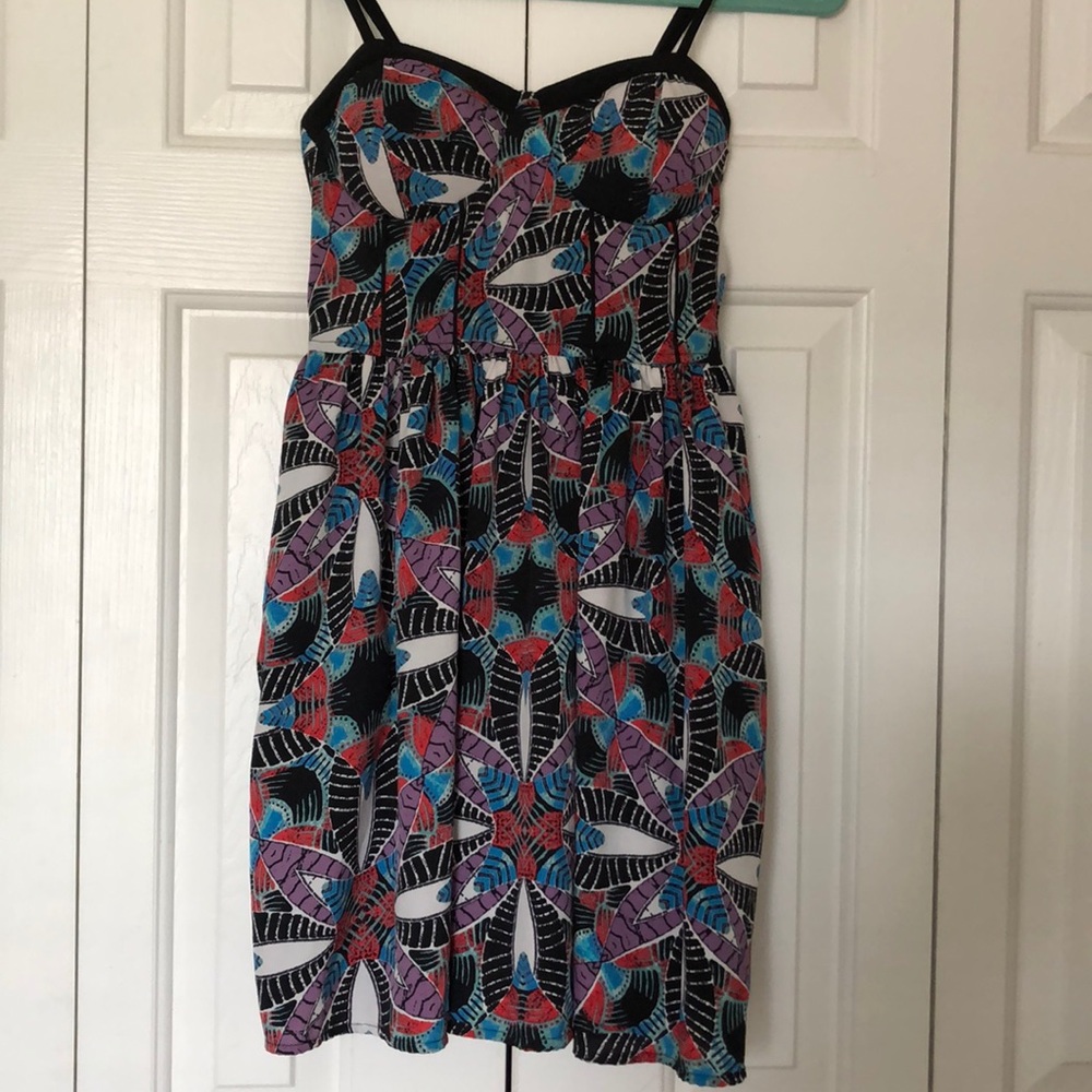 A blue, purple, white and red mini dress